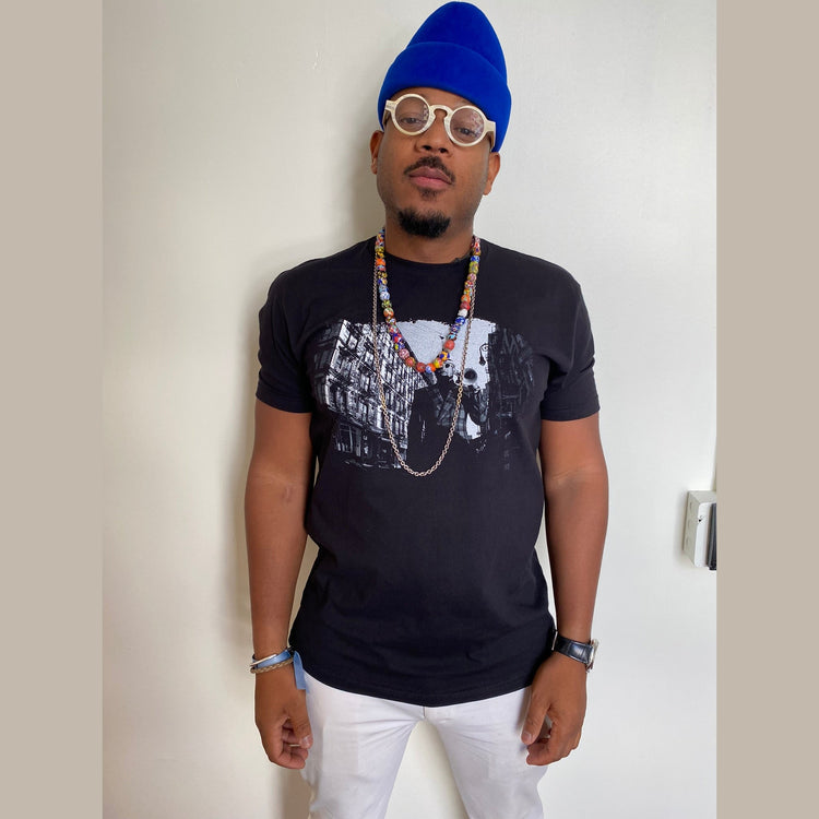 tee-black-front charles with trumpet in street-back "san juan hill a new york story"